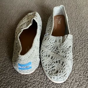 Tom’s silver glitter slip on flats
